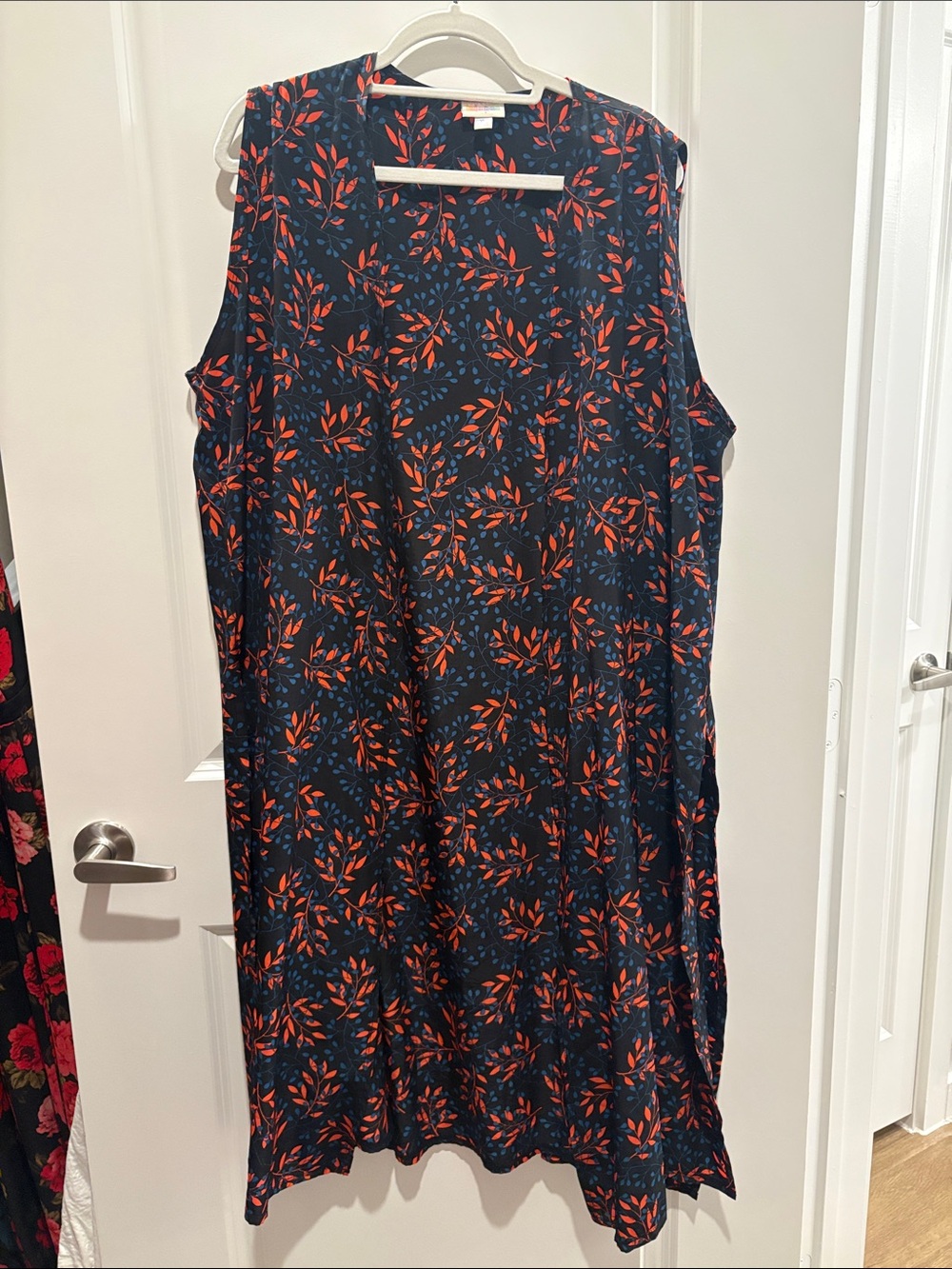 Lularoe Sleeveless Joy Navy Vest with Orange and Blue Leaf Print
